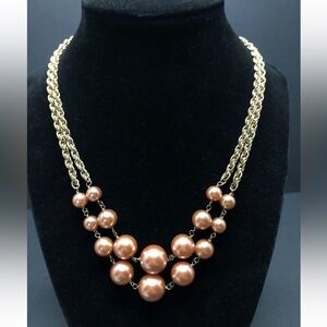 Gold tone and copper tone faux pearl necklace